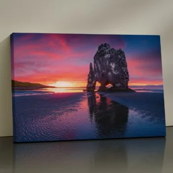 Prism Monolith Canvas Print – dramatic sunset seascape with rock stack by Artfy Canvas